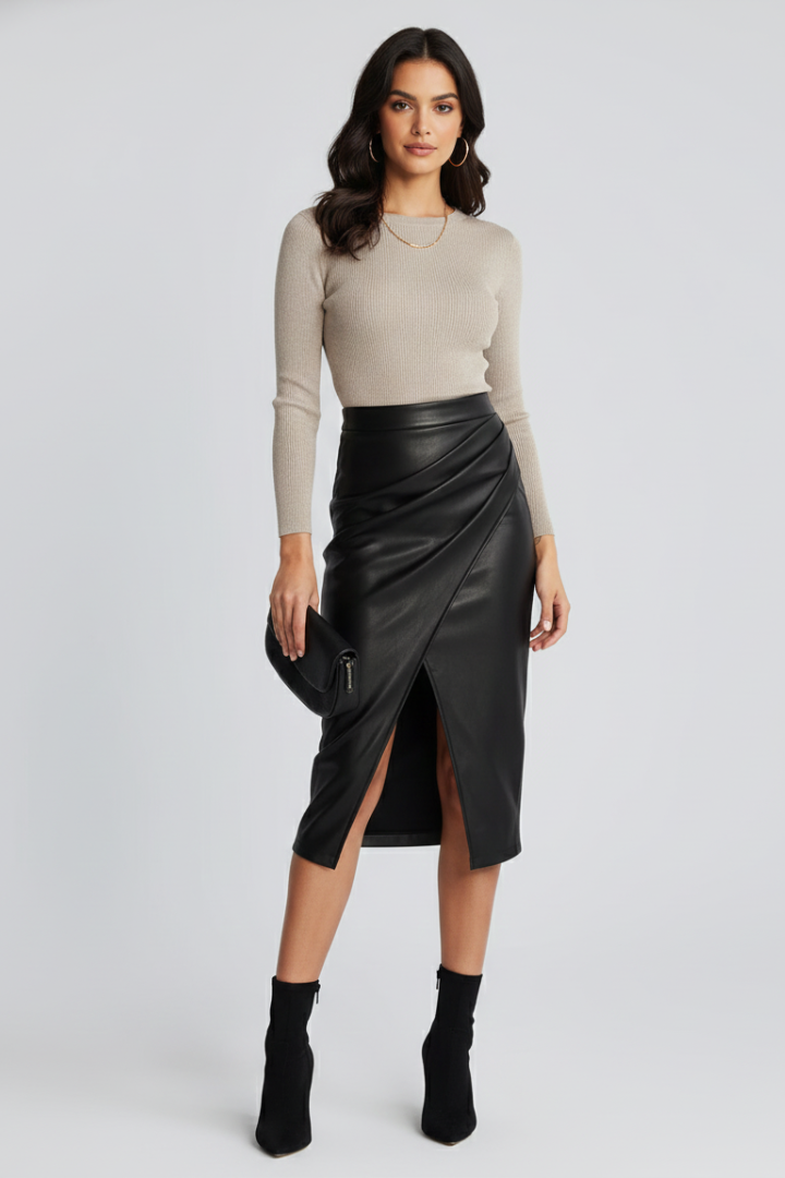 Sophisticated black pleated midi skirt featuring a trendy front split, easy to dress up or down