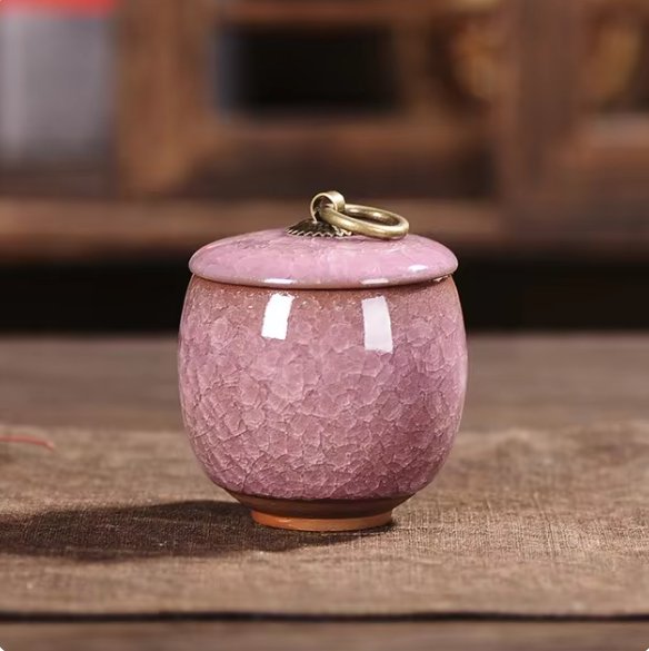 Peaceful ceramic pet urn with craquelé glaze, a beautiful home memorial for beloved pet ashes.