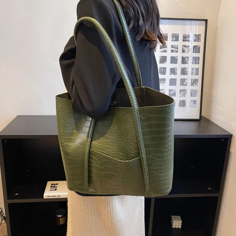 Side view of a structured croc embossed shoulder bag, women's stylish leather handbag