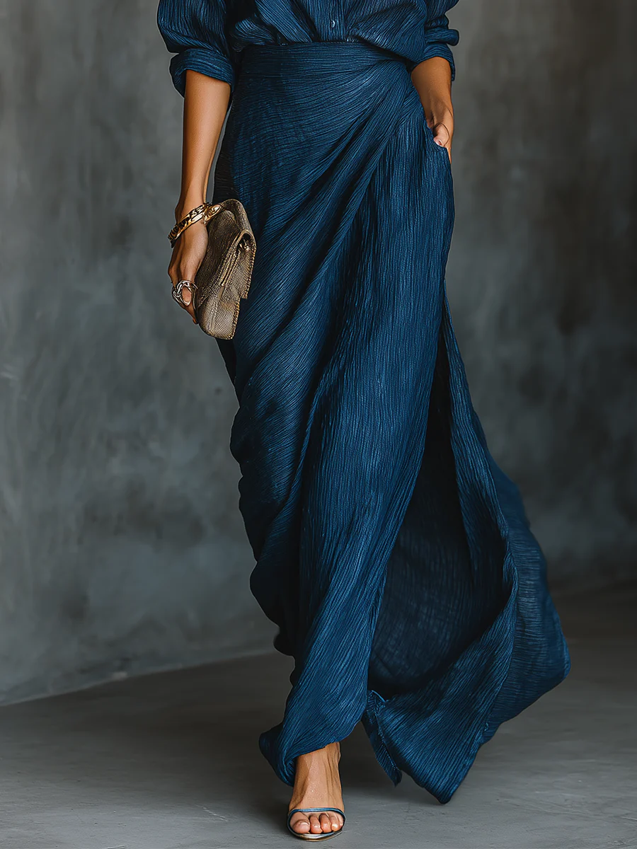Stylish women's dark blue long skirt and shirt set, a comfortable and elegant two-piece ensemble for diverse settings.