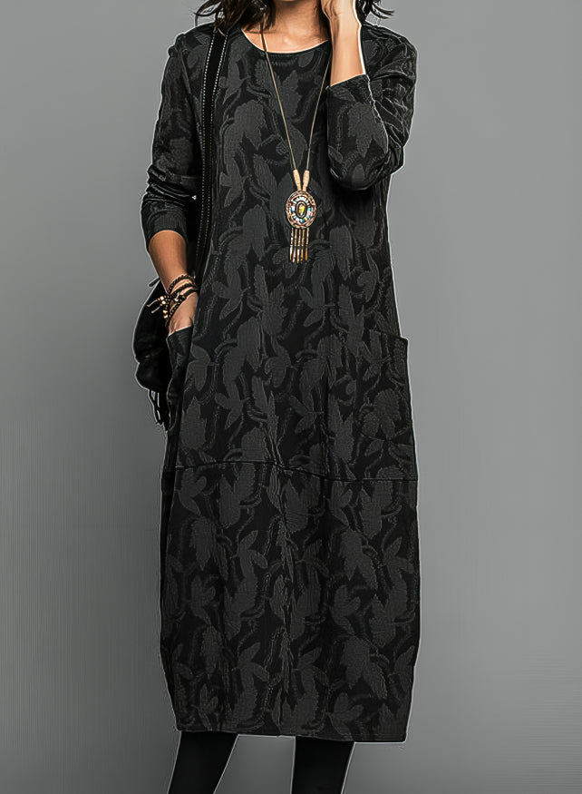 Stylish women's jacquard knit long sleeve maxi dress, ideal for an elegant fall or winter outfit.