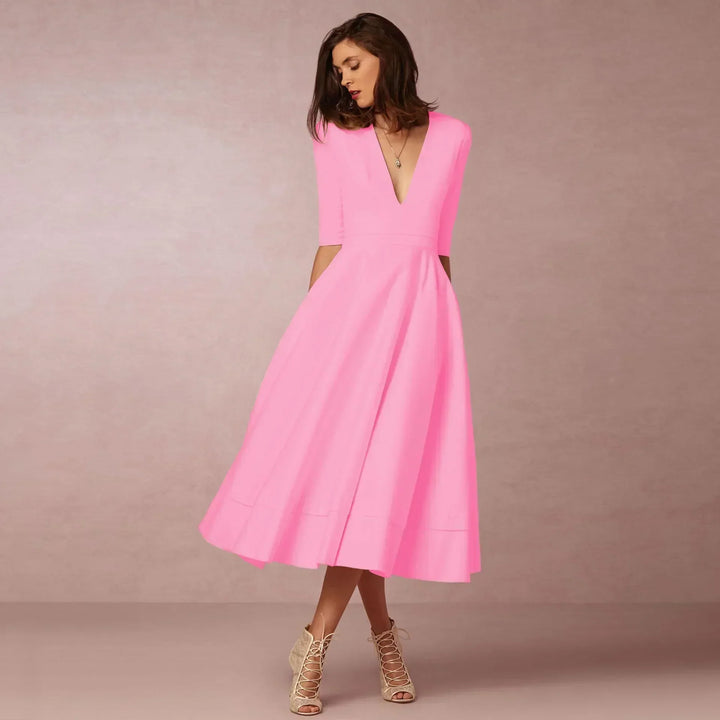 Classic women's fitted midi dress, perfect for a polished summer day outfit. Comfortable fabric.
