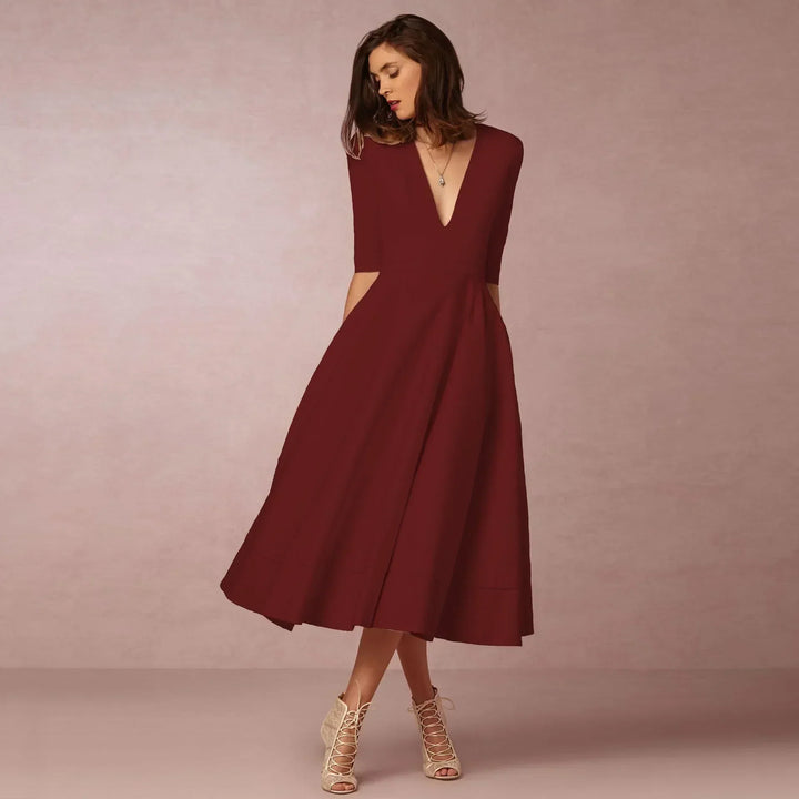 Classic sleeveless midi dress for women, embodying sophisticated summer fashion. Flattering fit.