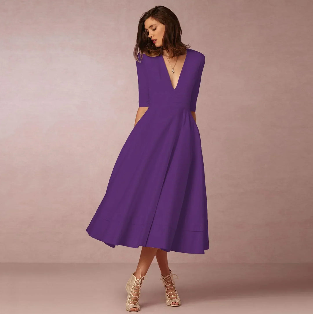 Sophisticated sleeveless summer midi dress, a versatile piece for any woman's collection.