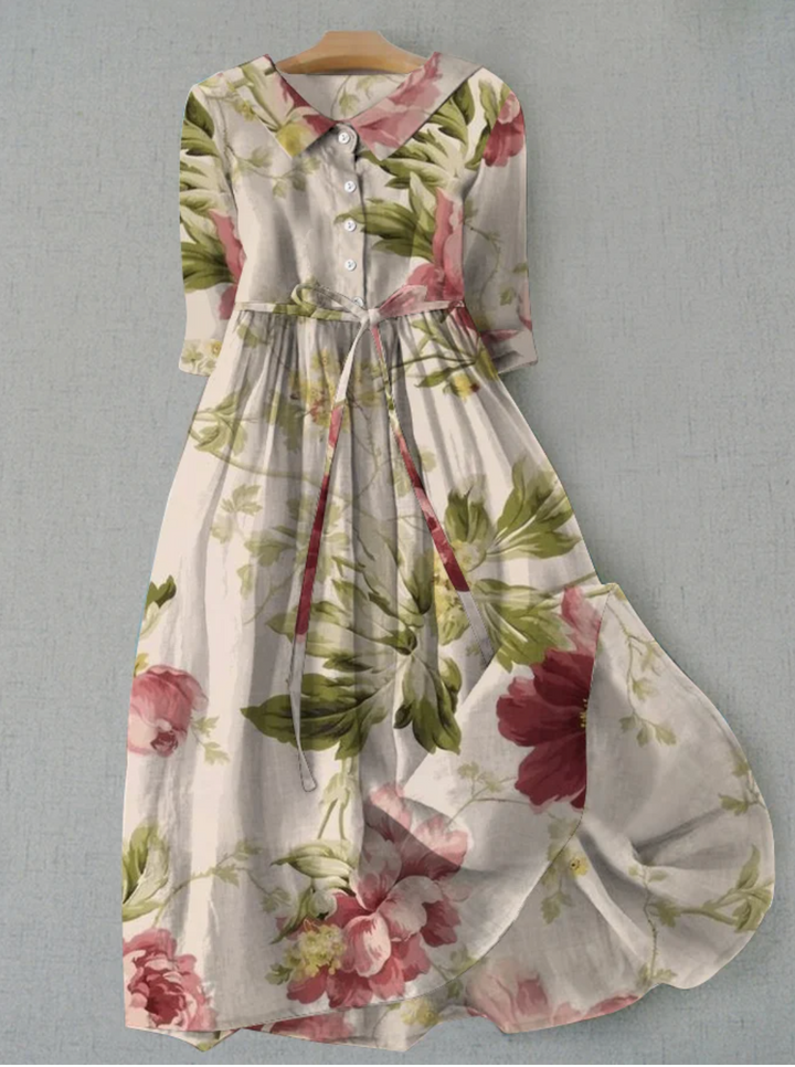Elegant floral button-down midi dress for women. Perfect summer vacation or garden party attire with a tie waist.