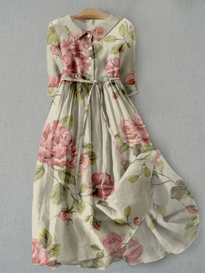Feminine floral print button-down midi dress for women, featuring a stylish tie waist. Great for summer elegance.