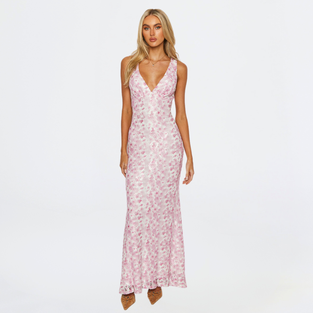 Elegant floral pink maxi dress for women, ideal wedding guest attire, shown front view.