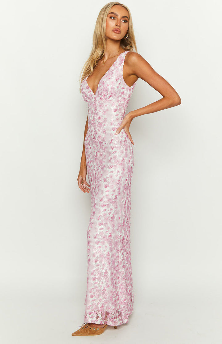 Gorgeous women's floral summer dress, suitable for wedding guests, with flowing skirt.
