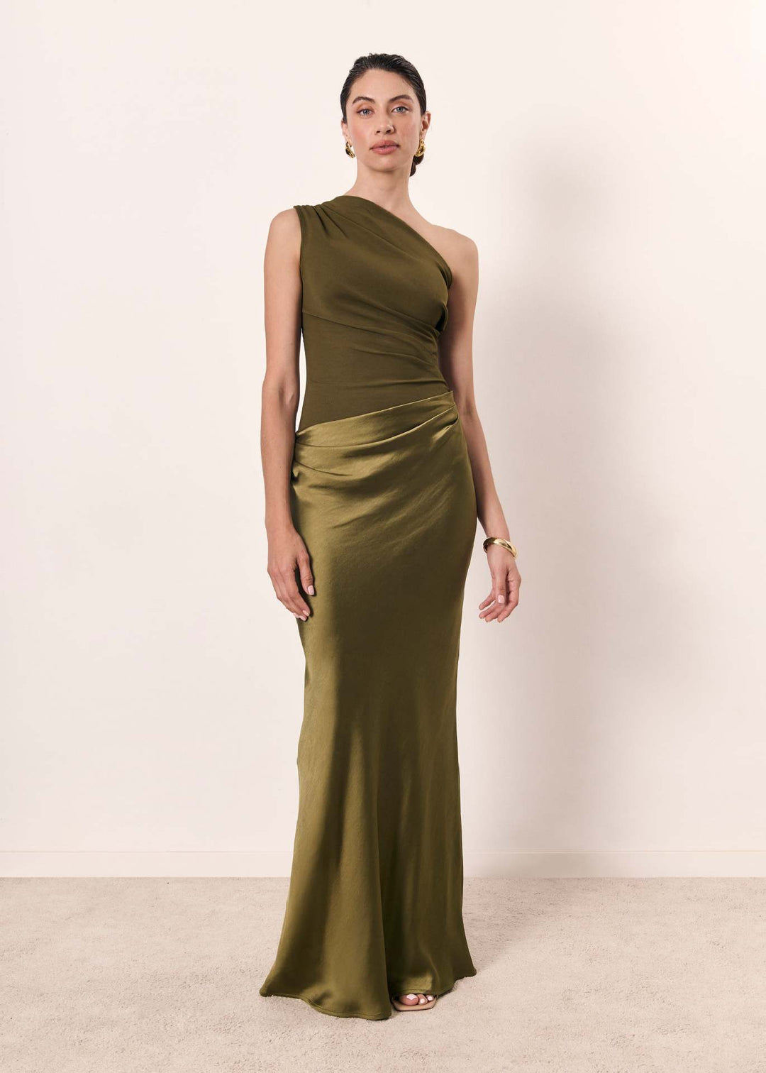 Long elegant maxi dress for women with graceful drapes, suitable as a party or formal dress.
