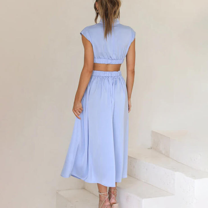 Sophisticated women's summer midi dress, sleeveless and flowy, ideal for an elegant casual look.