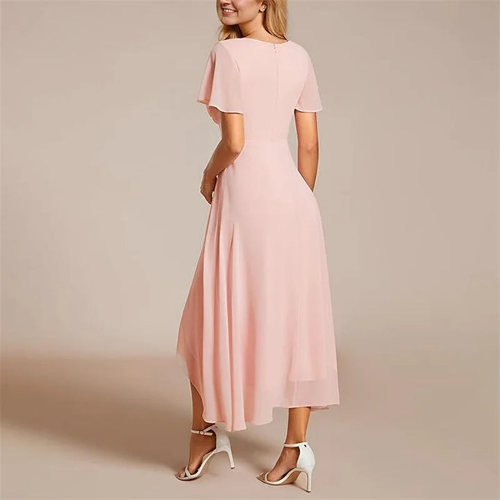 Sophisticated flowy A-line summer dress with charming V-neck, perfect women's apparel.