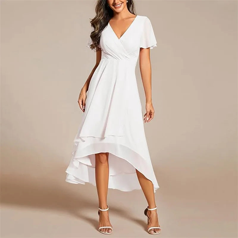 Beautiful close-up of the V-neck and flutter sleeve detail on a women's maxi dress.