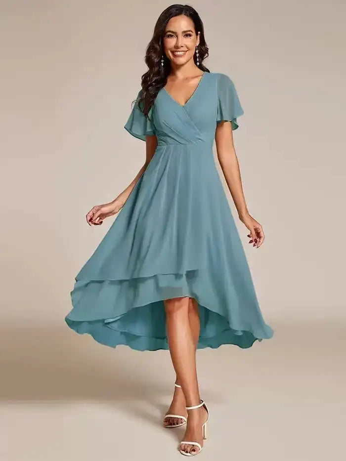 Side profile of an elegant V-neck A-line maxi dress, highlighting its graceful drape.