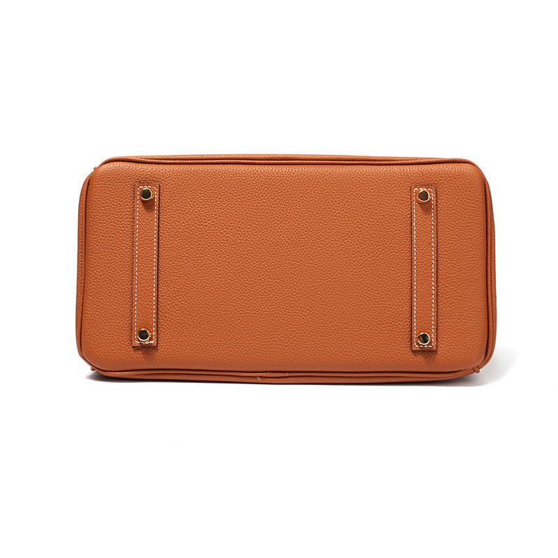 Structured luxury women's leather handbag, organized for daily elegance.