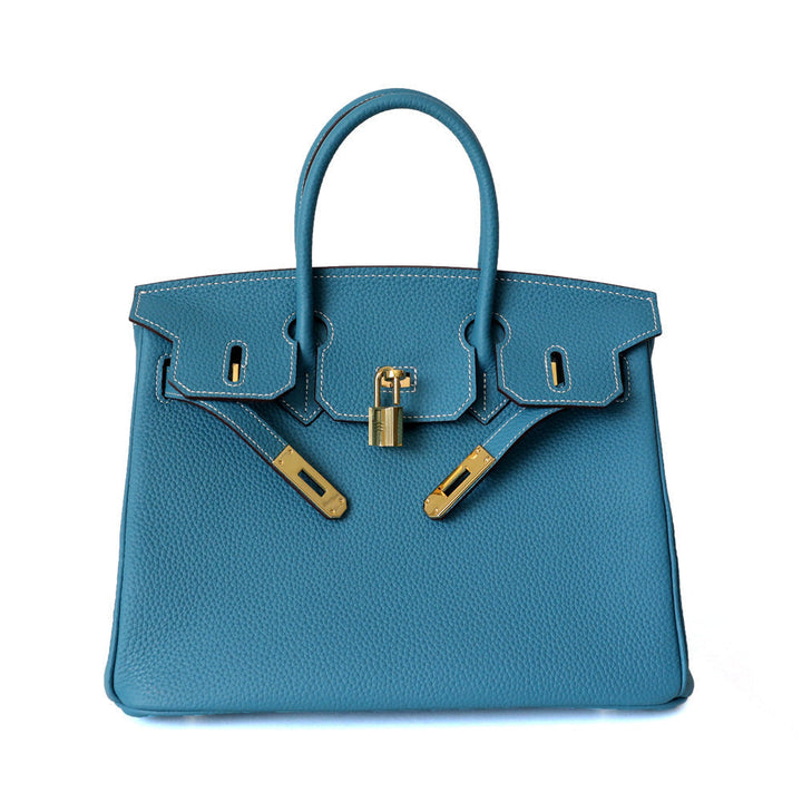 Professional women's leather shoulder bag, everyday elegant genuine leather style.