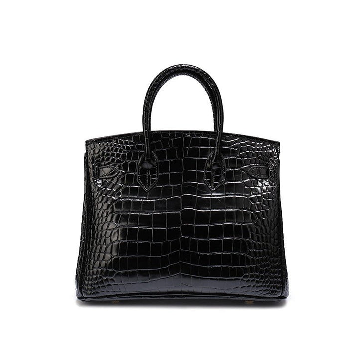 Upscale genuine leather women's handbag, an elegant everyday fashion essential.