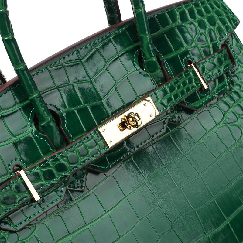 Distinctive luxury women's leather shoulder bag, organized and chic.