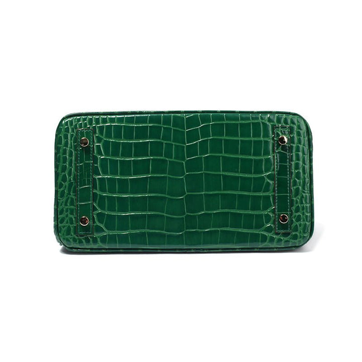 Chic women's leather shoulder bag, organized for daily luxury and style.