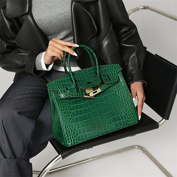 Versatile women's genuine leather shoulder bag, everyday chic luxury item.