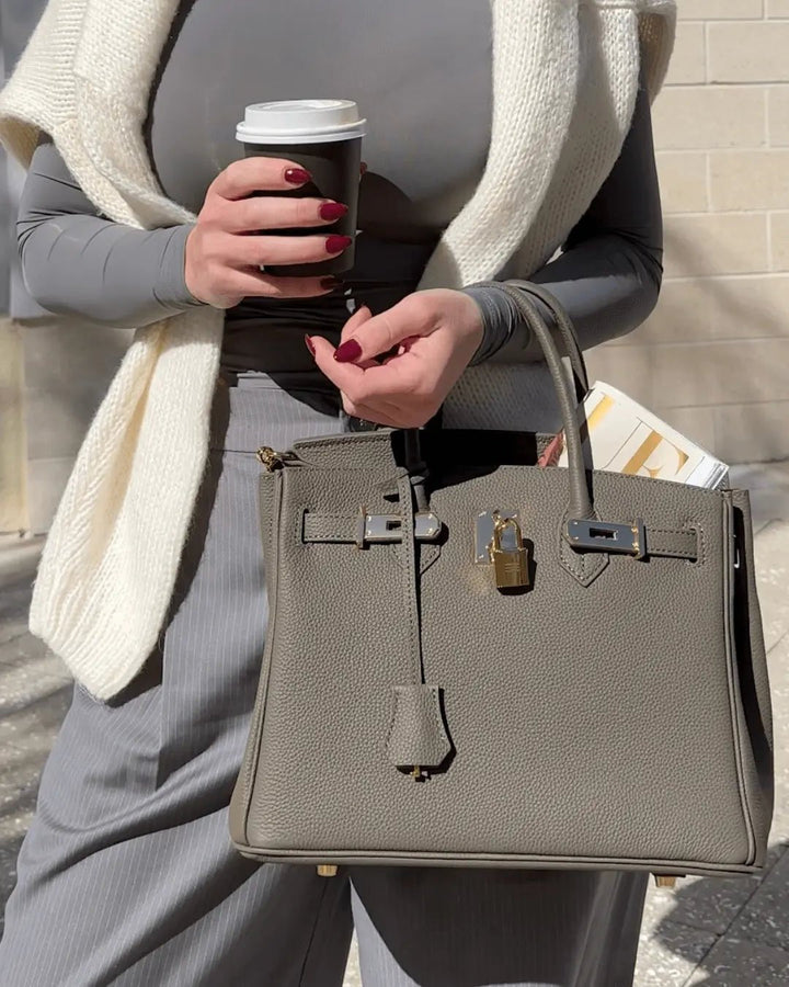 Functional genuine leather women's handbag, chic for everyday elegant style.