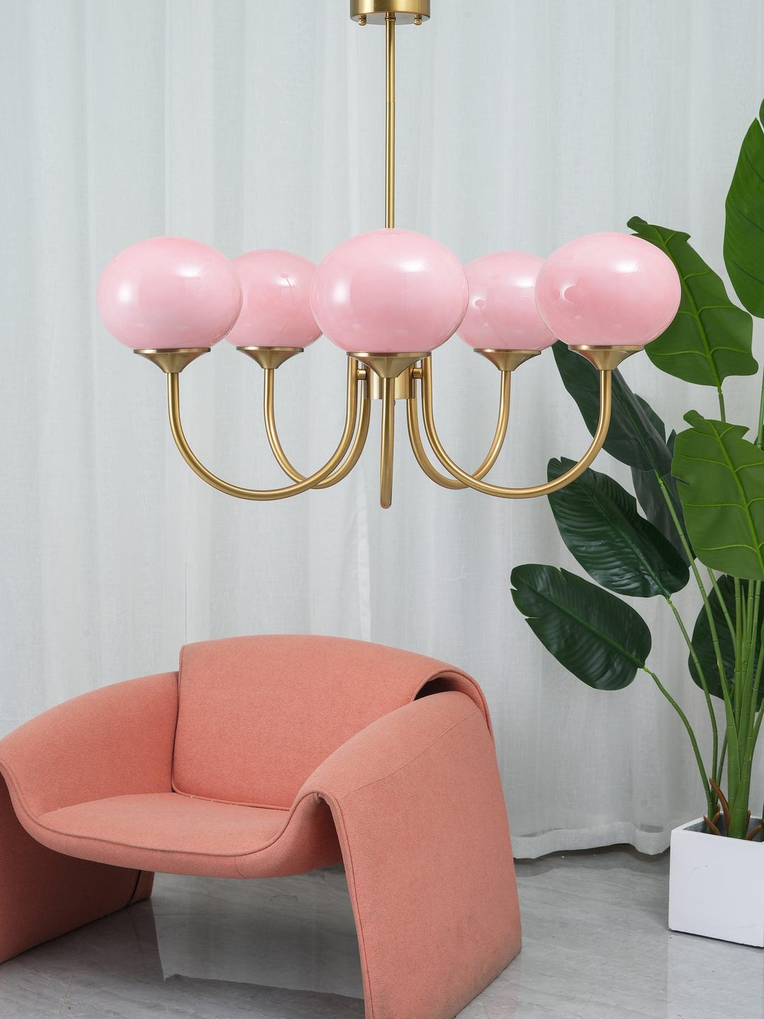Sophisticated glass sphere pendant lamp for ambient lighting.