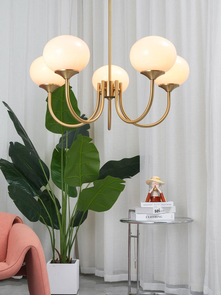 Stunning brass glass sphere pendant, ideal for modern homes.
