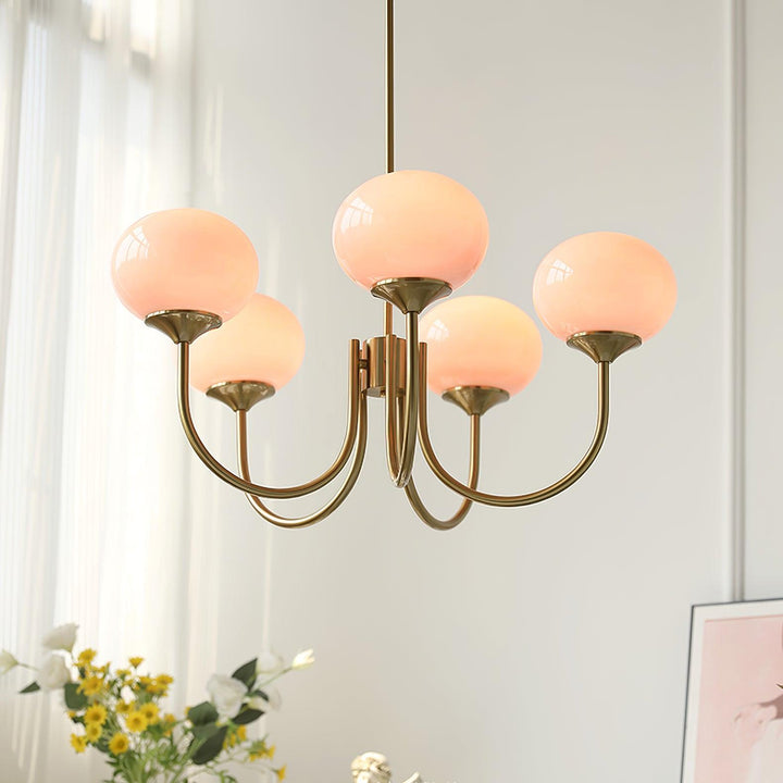 Modern brass glass sphere pendant lamp for living rooms.
