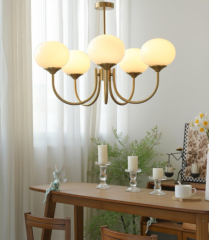 Stylish glass globe pendant lamp, ambient living room light.