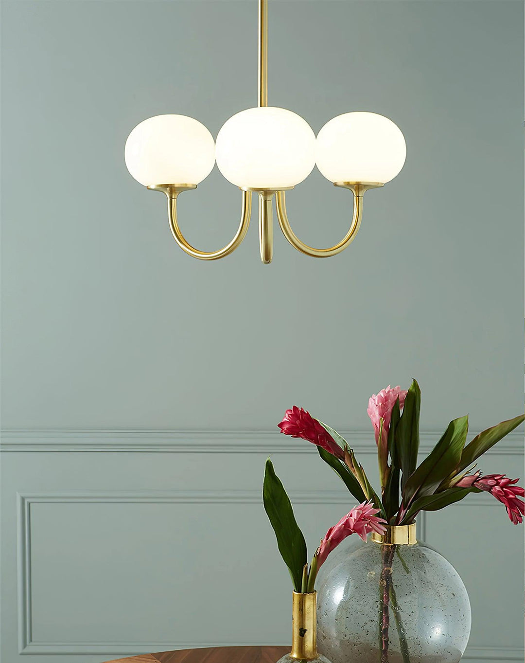 Silver-tone chrome glass sphere ceiling light, modern living.