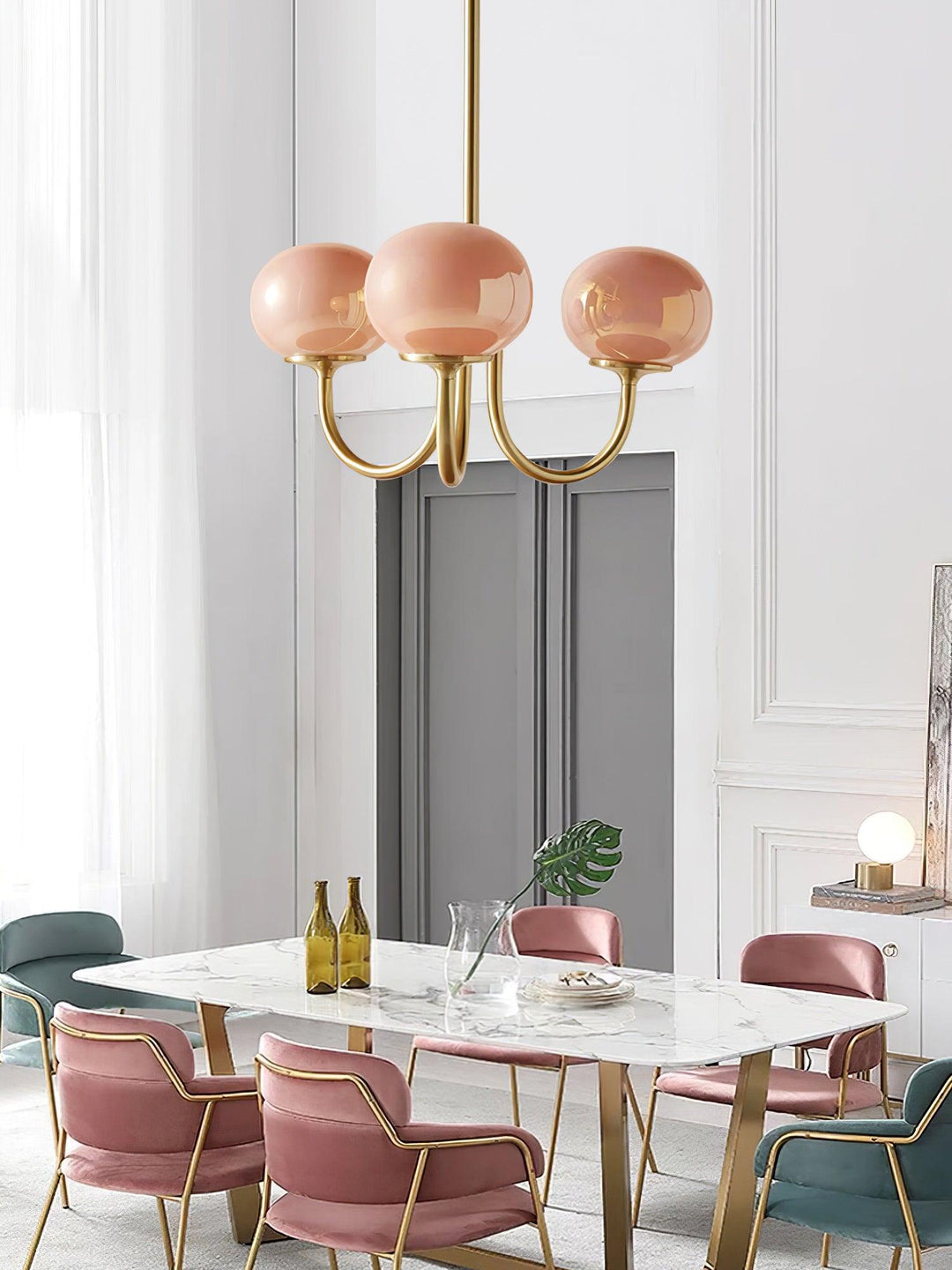 Elegant brass finish glass sphere ceiling light.