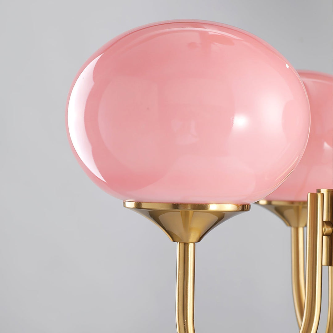 Chic chrome ceiling light with luminous glass spheres.