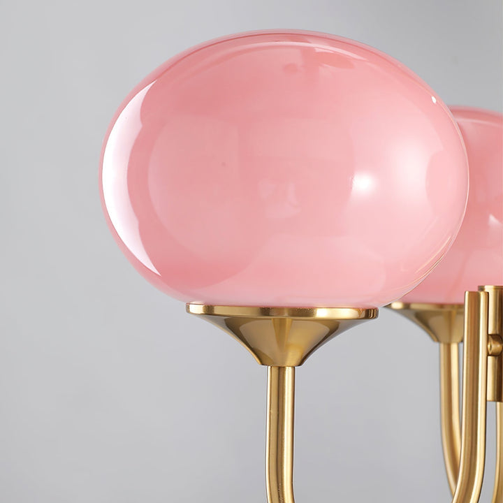Chic chrome ceiling light with luminous glass spheres.