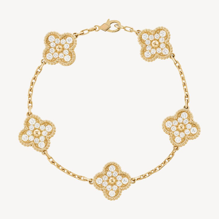 Stylish women's bracelet featuring elegant clover charms and polished agate beads.