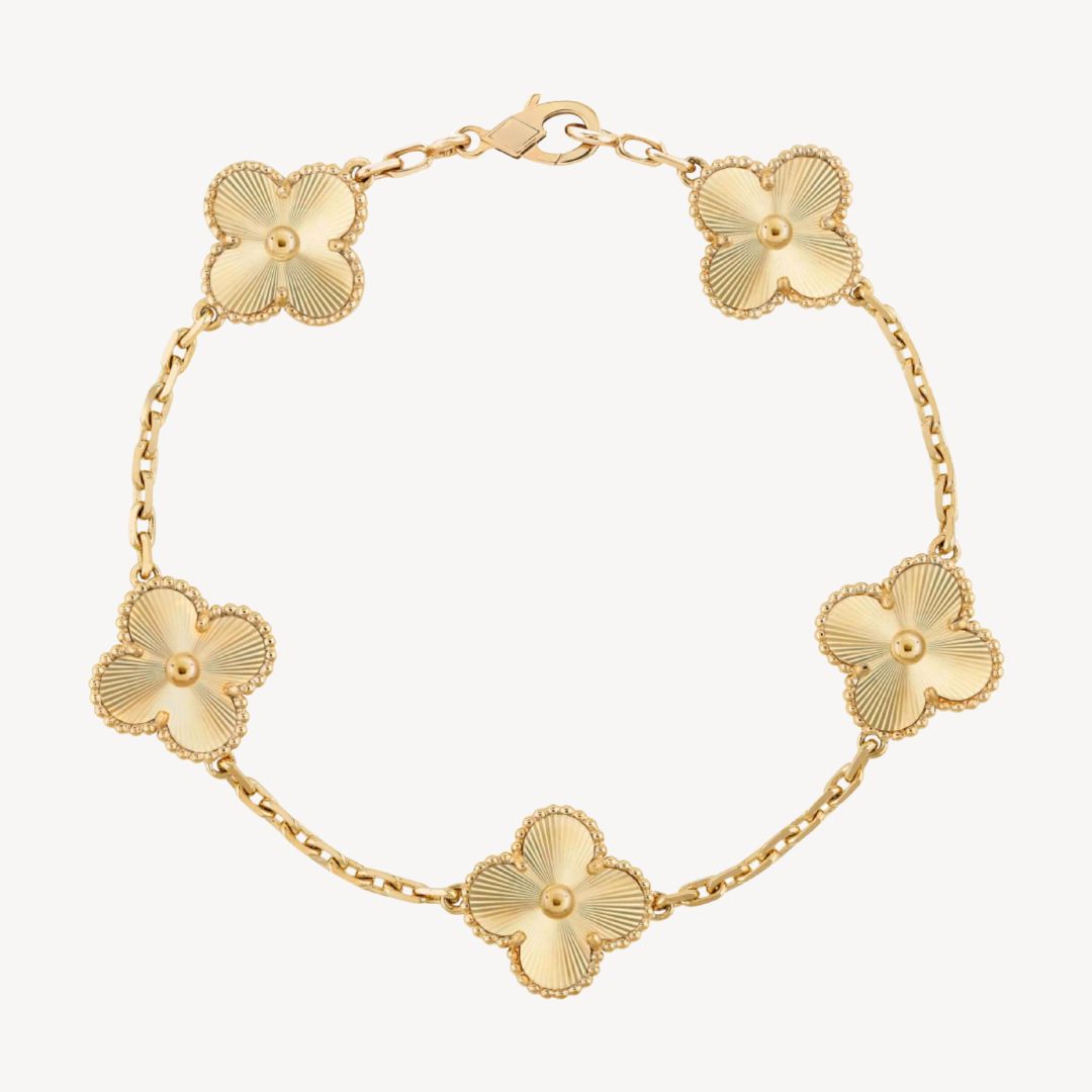 Beautiful gold charm bracelet with multiple clover designs, an ideal gift for her.