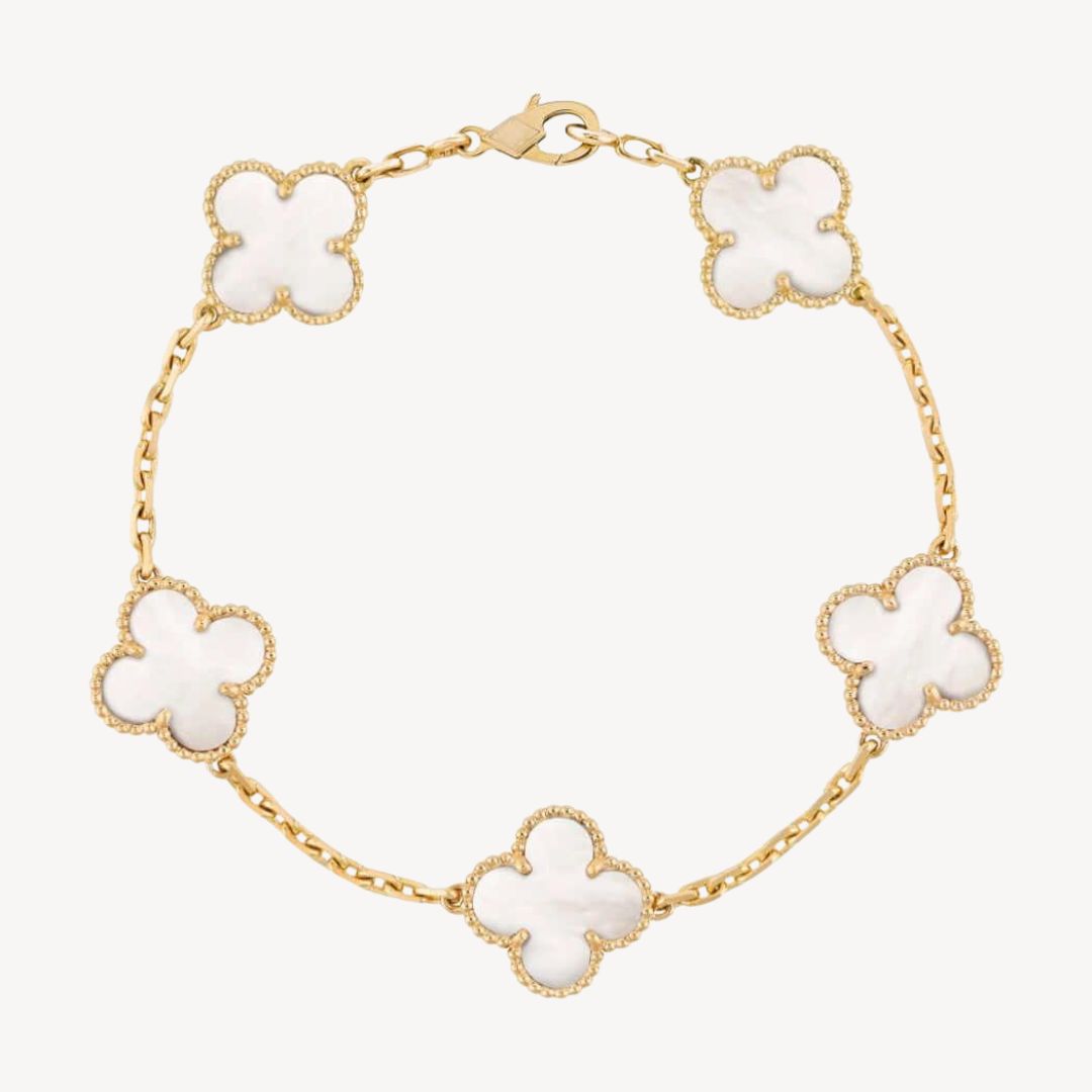 Delicate gold clover charm bracelet, a perfect elegant jewelry gift for her.