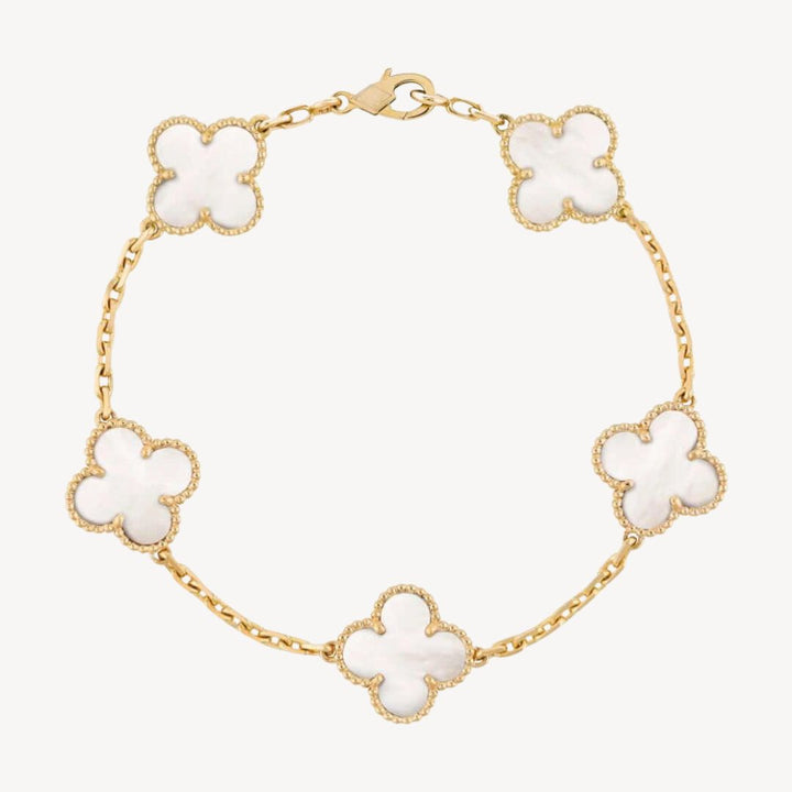 Delicate gold clover charm bracelet, a perfect elegant jewelry gift for her.