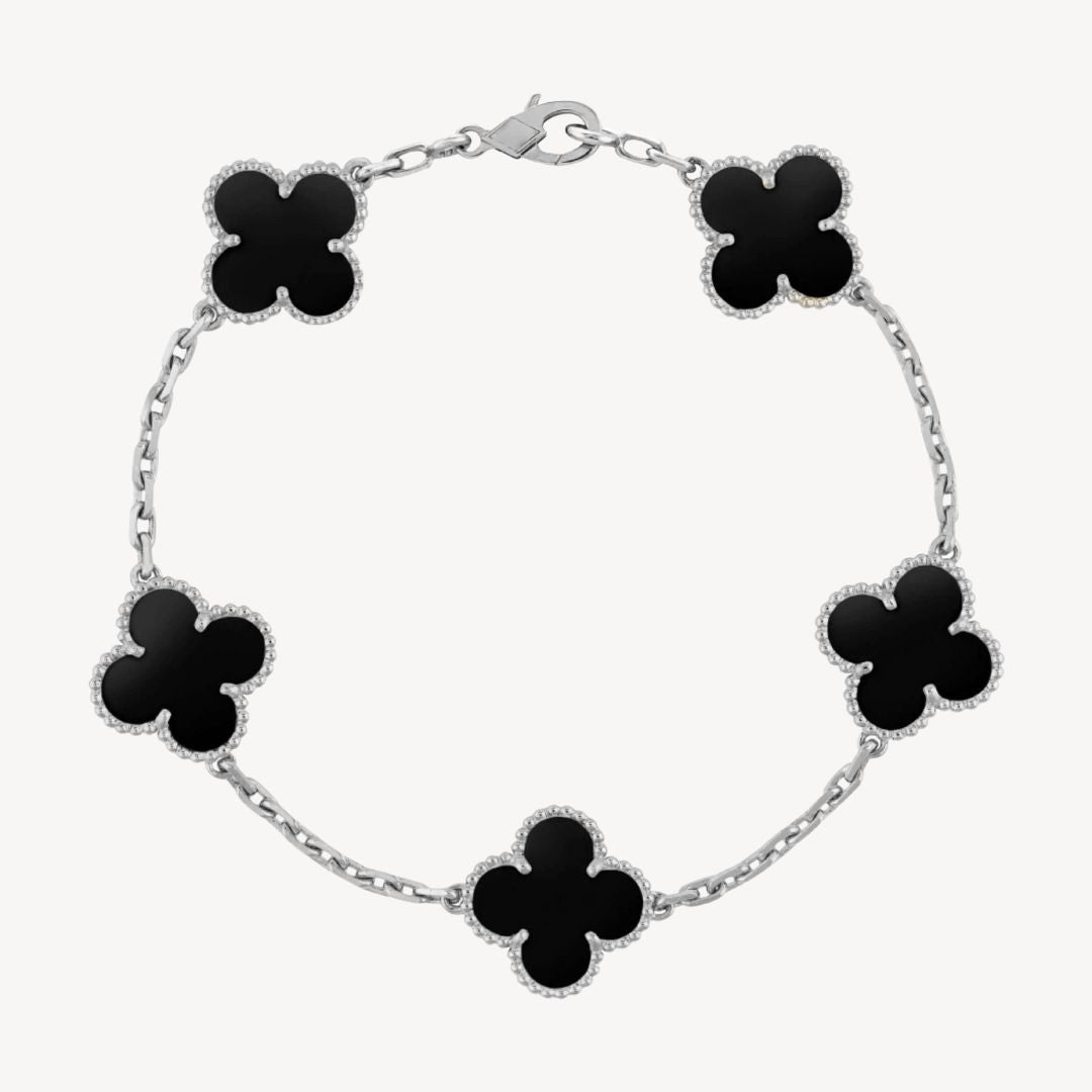 Women's elegant silver clover bracelet, versatile for daily wear or special occasions.
