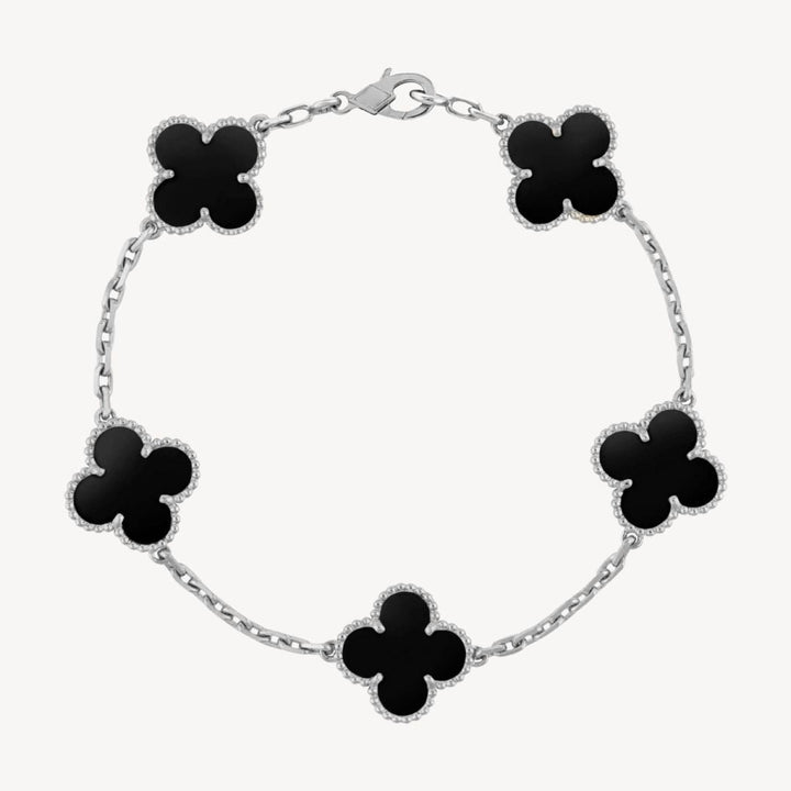 Women's elegant silver clover bracelet, versatile for daily wear or special occasions.