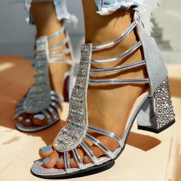 Pair of white strappy block heels, ideal open-toe sandals for women's summer wear