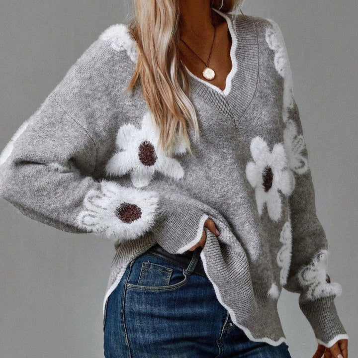Elegant gray women's V-neck floral knit sweater, perfect for winter fashion and cozy wear.
