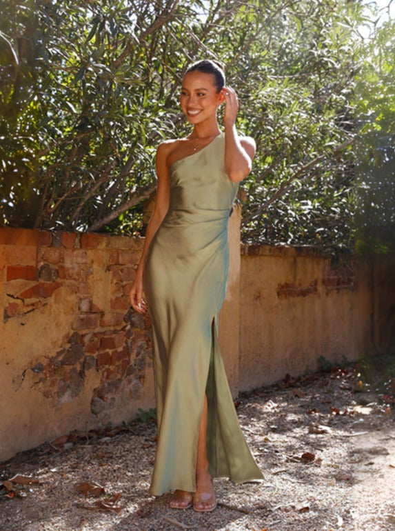 Solid emerald green one shoulder maxi dress, a stylish choice for spring fashion.