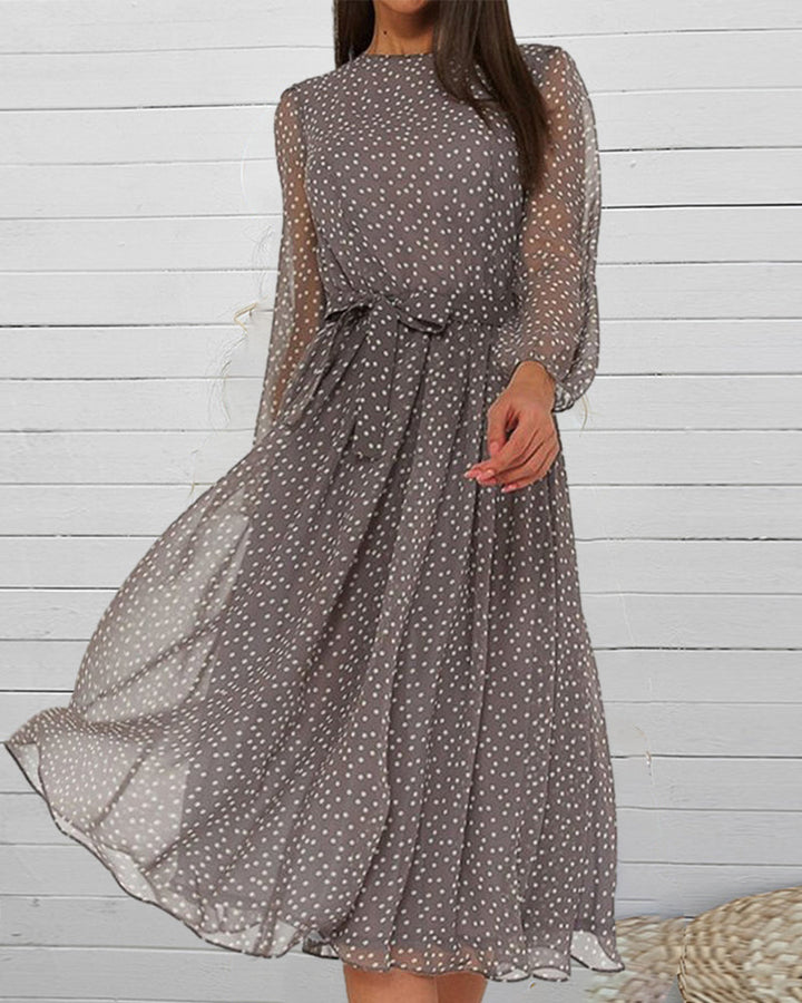 Women's knee-length polka dot A-line dress, featuring long sleeves and a stylish grey design for elegant fashion.