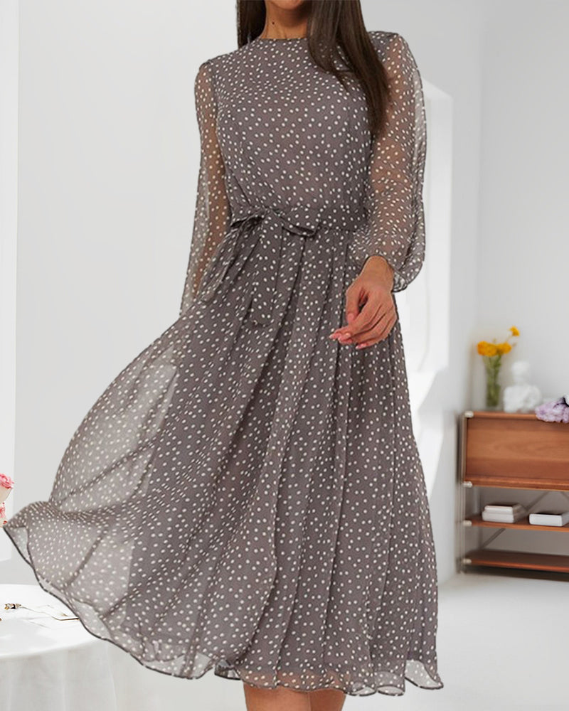 Chic women's grey polka dot A-line dress with long sleeves. Ideal for casual elegance & comfortable everyday wear.