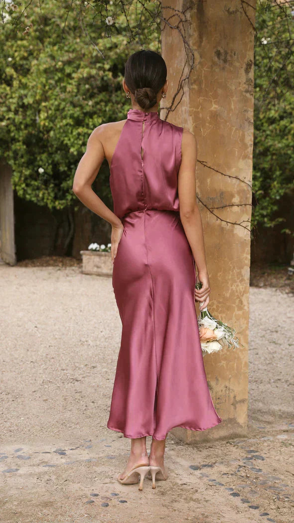 Elegant women's party dress: black halter midi with flattering draped neckline, summer fashion.