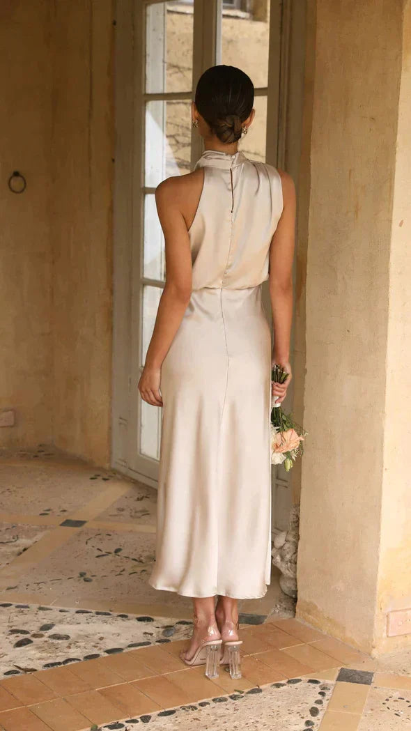Women's summer cocktail dress, a stylish halter midi with a chic draped neckline.