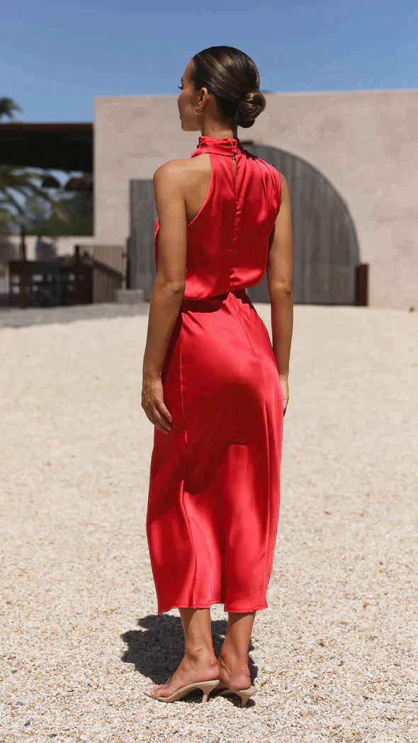Fashionable women's halter midi dress, a versatile piece with an elegant draped neckline.