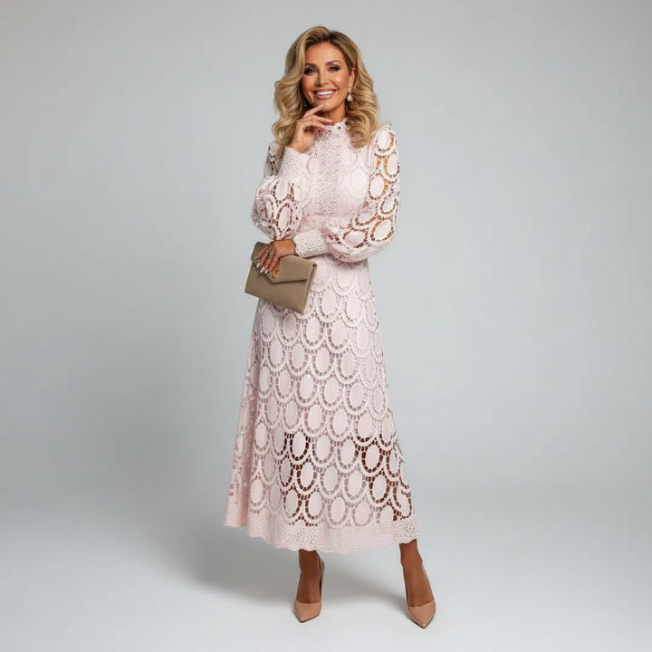 Modest yet elegant women's midi formal gown with high neck and long sleeves, perfect for a wedding guest.