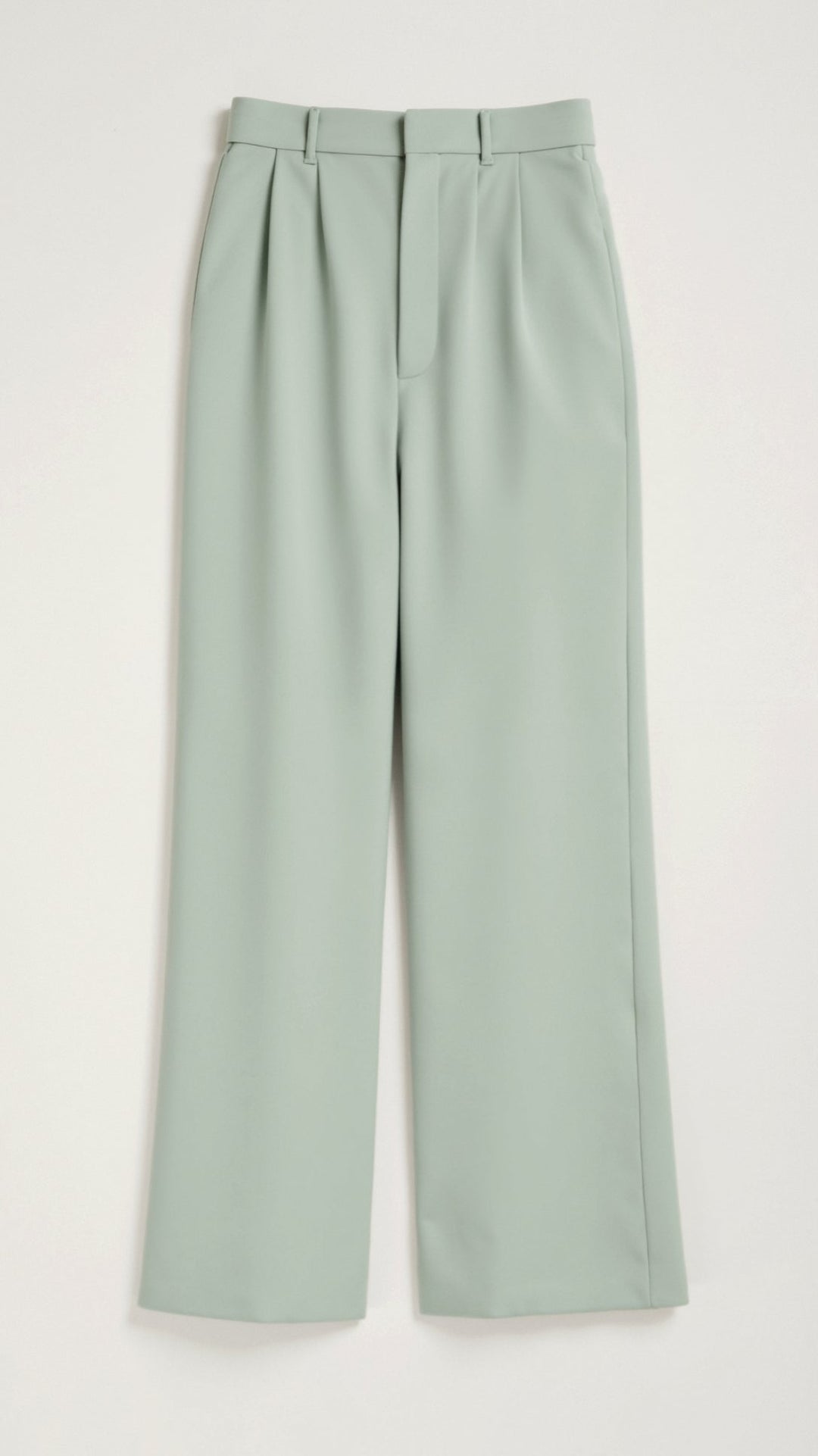 Textured fabric detail on women's high-waisted wide-leg trousers, a key aspect of comfort fit.