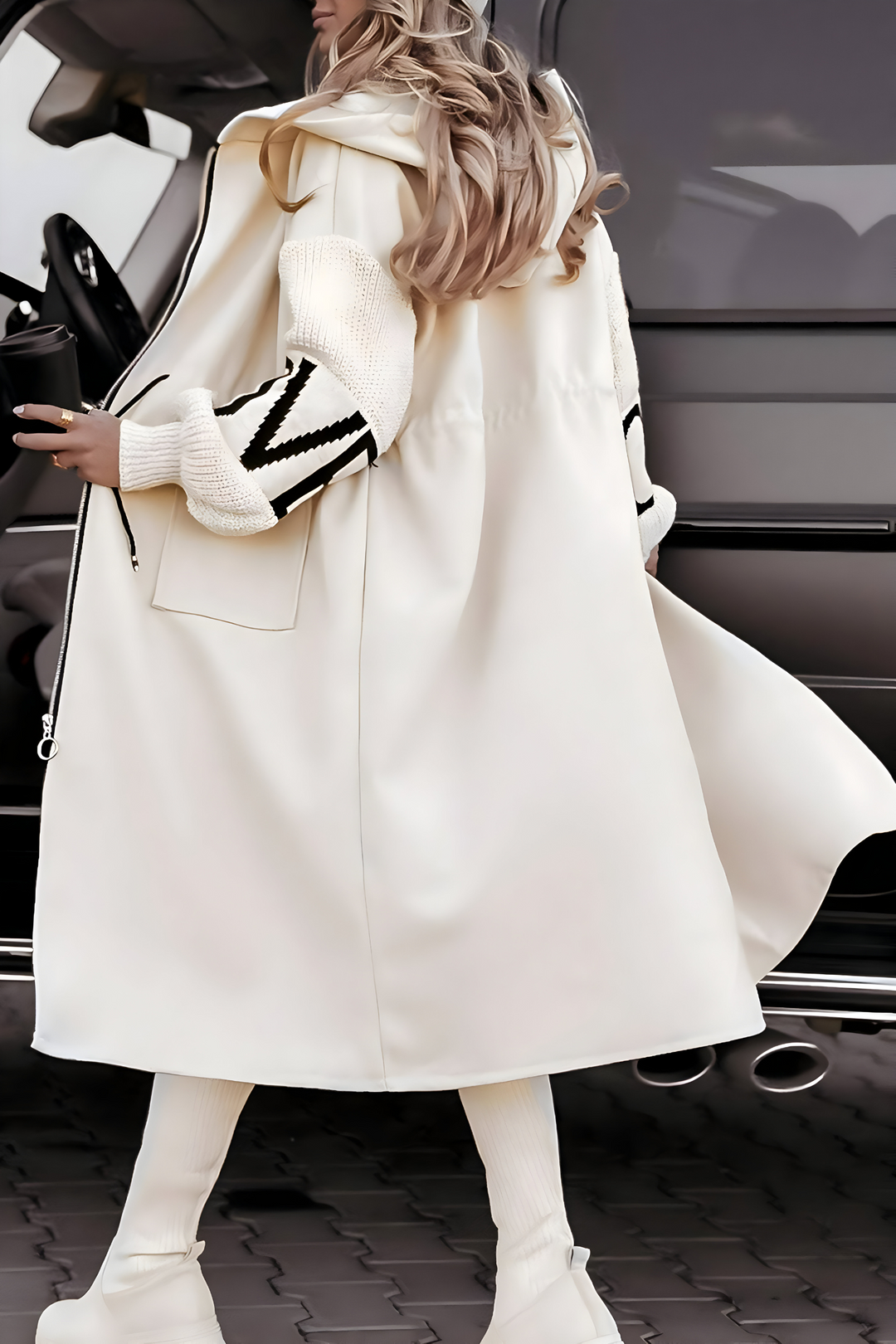 Fashionable women's hooded knit cardigan in a classic elegant design.