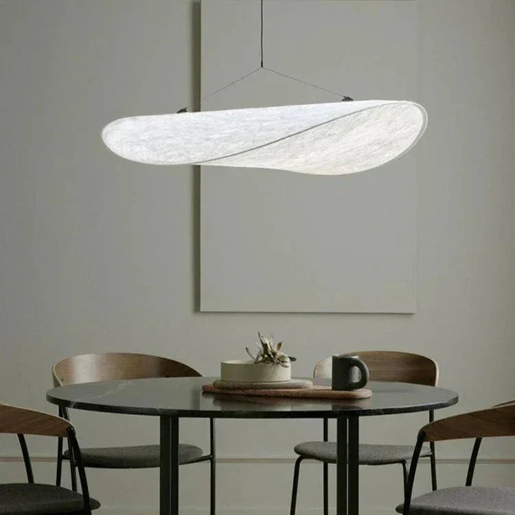 Handmade Japanese silk lamp with gentle wave design, providing elegant ambient ceiling lighting for home.